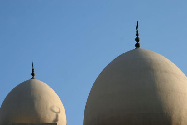 Image of Domes of the Grand Mosque in Bur Dubai with setting sun, Dubai,