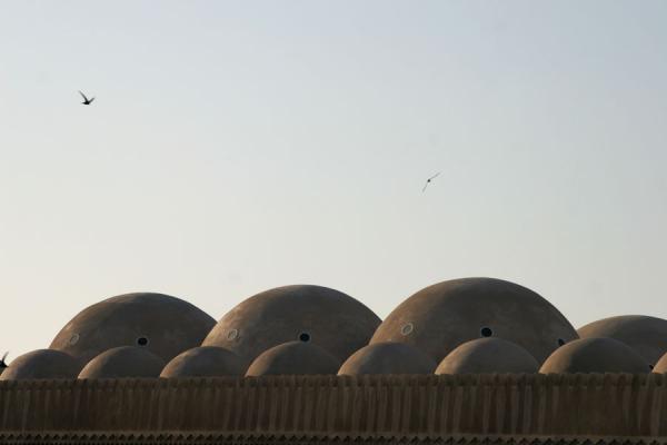 Domes of Grand Mosque in Bur Dubai just before sunset