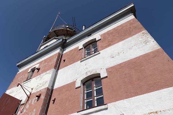 Picture of Looking up the red and white lighthouse of MärketMärket - Åland Islands