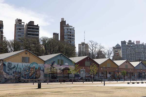 Picture of Buildings on the costanera of Rosario with colourful murals