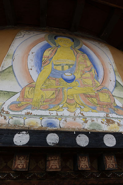 Picture of Dumtseg Lhakhang (Bhutan): Image of Buddha painted inside the Dumtseg Lhakhang at the highest level, representing heaven