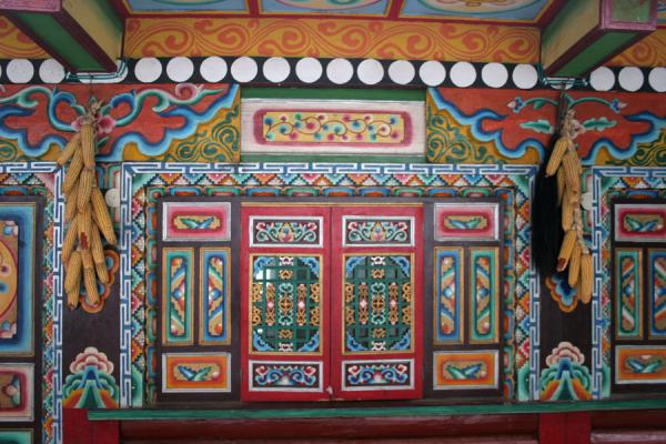 Picture of Jiaju Tibetan village (China): Brightly coloured and intricately decorated Tibetan house