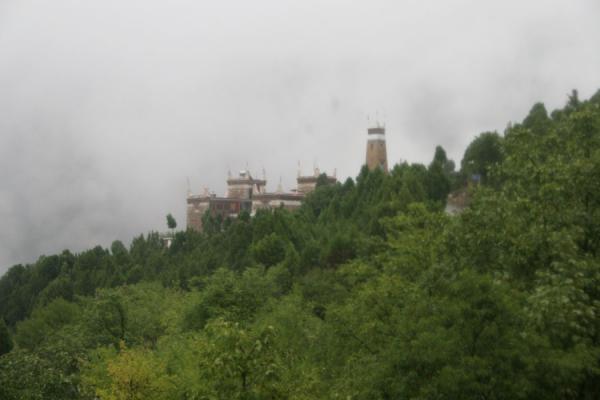 Picture of Jiaju Tibetan village (China): Tibetan house and watchtower seen from a distance in Jiaju