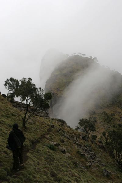 Picture of Simien Mountains (Ethiopia): Fog creeping over the edge of the escarpment near Chennek Camp