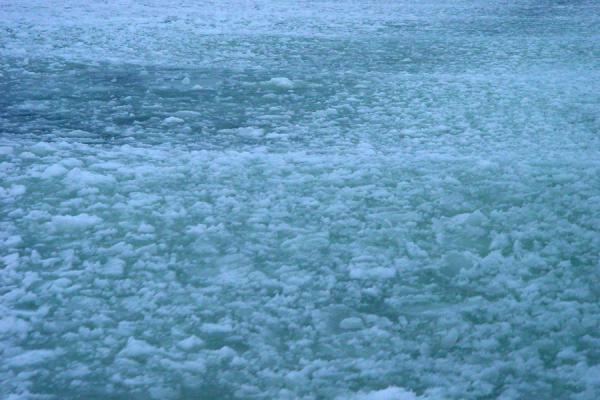 Waves behind the boat were quickly absorbed by the surrounding ice | Helsinki Harbour Winter | Finland