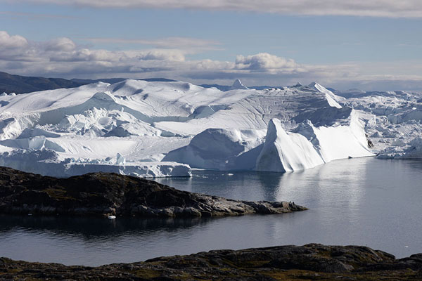 Landscape of ice seen from the mainland at the icefjord of Ilulissat | Fjord Glacé d'Ilulissat | 