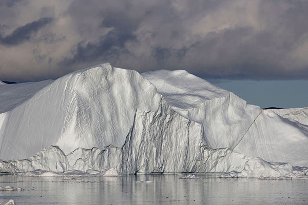 Picture of Massive iceberg in the afternoon at the mouth of the icefjord of Ilulissat - Greenland - Europe