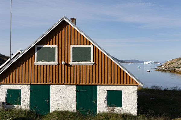 Building in Narsaq with icebergs in the background | Narsaq | Greenland