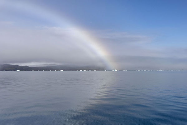 Rainbow over the fjord with icebergs | Qooroq fjord | Greenland