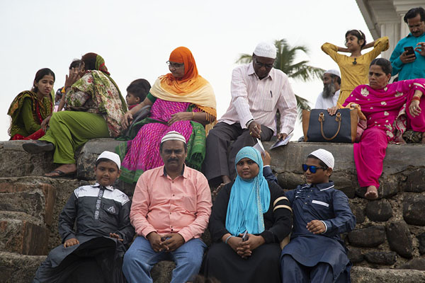 Colourfully dressed Indians resting near the tomb | Haji Ali Dargah | India