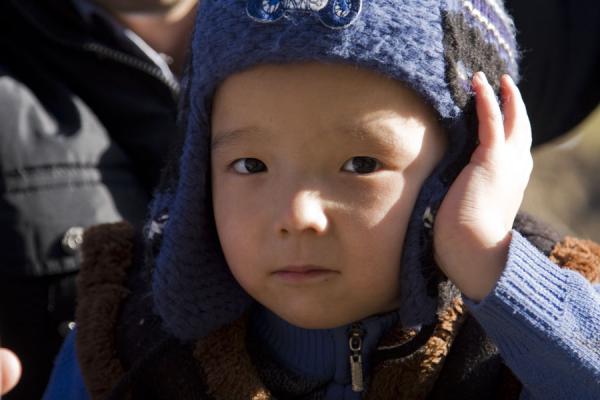 Picture of Kim-Asar hiking (Kazakhstan): Sweet Kazakh boy in the afternoon in Kim-Asar valley