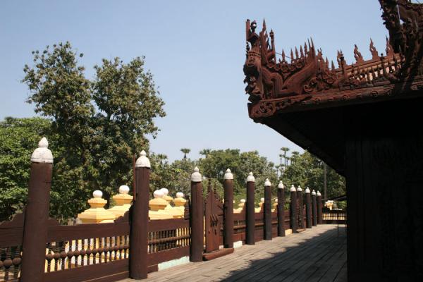 Picture of Mandalay (Myanmar): Teak Monastery in Mandalay with the typical wooden poles