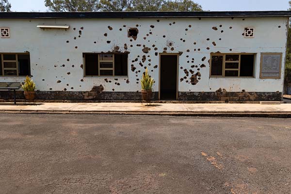 Foto van Bullet holes still in the walls of the building in which the Belgian peacekeepers were killed on April 8, 1994Kigali - Rwanda