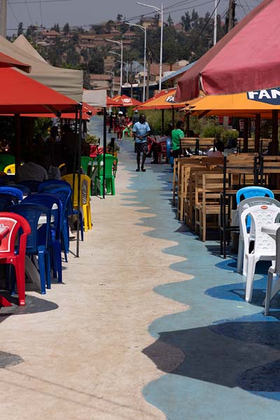 Street with bars and restaurants in the bustling district of Nyamirambo | Nyamirambo community | Rwanda