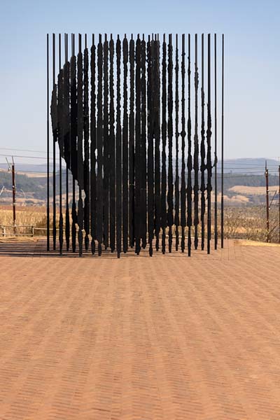 Picture of Mandela Capture Site (South Africa): Fifty steel poles representing the face of Mandela when seen at the right angle