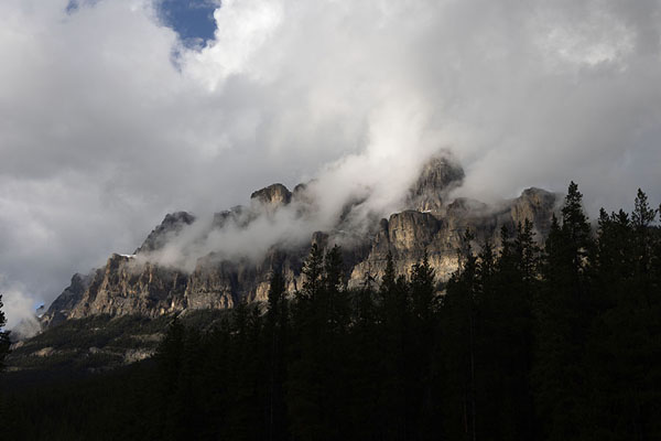 Picture of Clouds hovering over a mountain range in Banff National Park - Canada